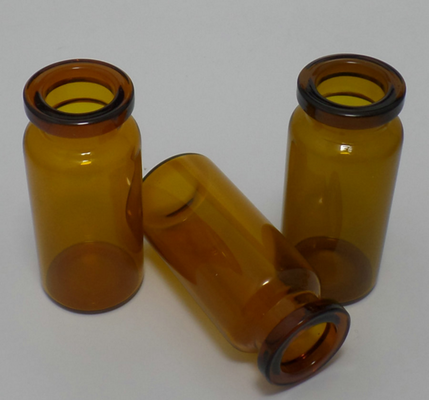 Viales de vidrio marrón de 10 ml con tapas y tapones.
